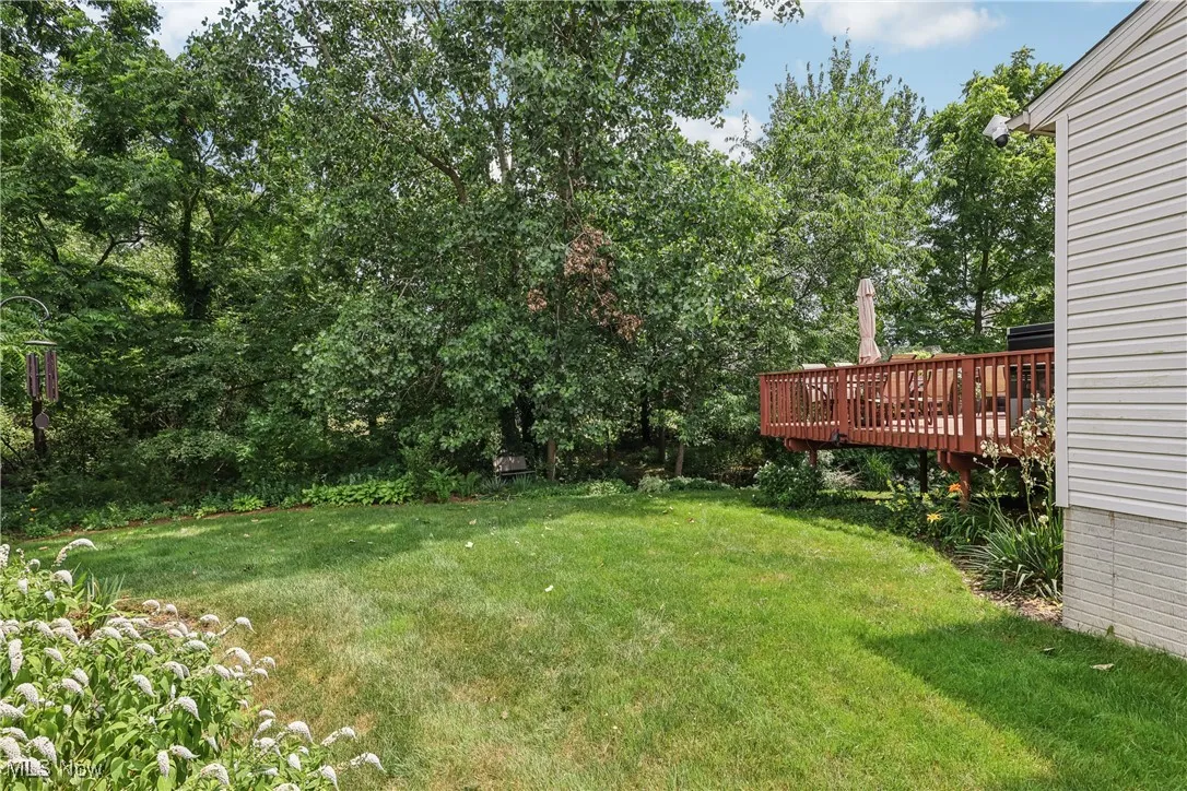 View of yard with a deck