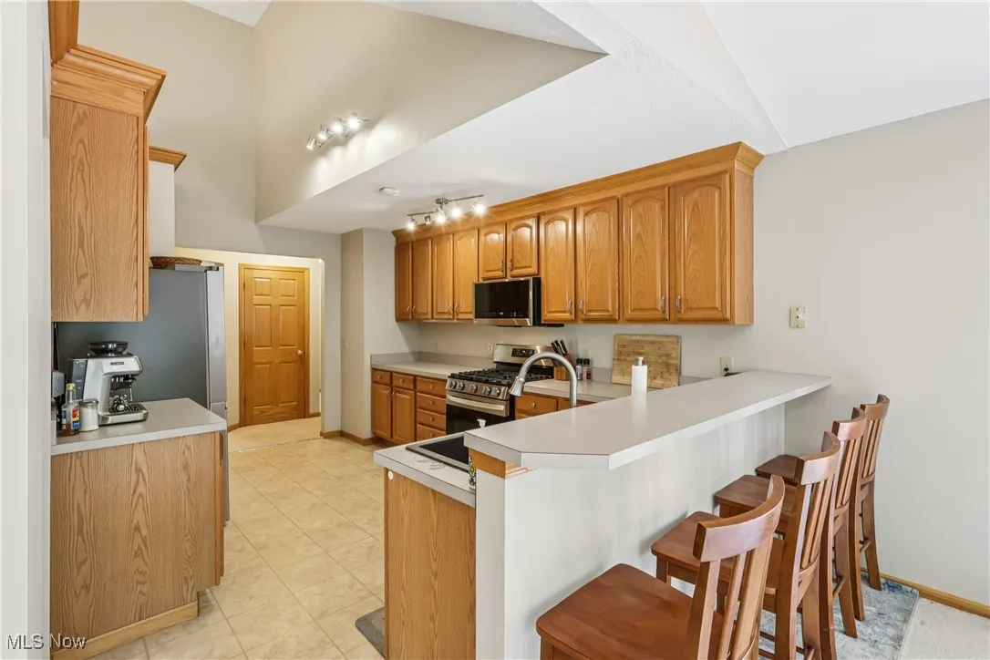 Kitchen featuring a breakfast bar