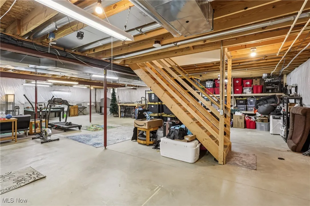 Unfinished large basement with plenty of storage