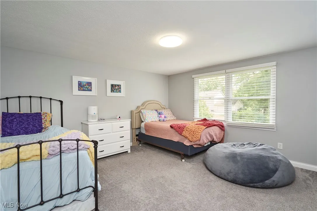 Bedroom featuring carpet flooring