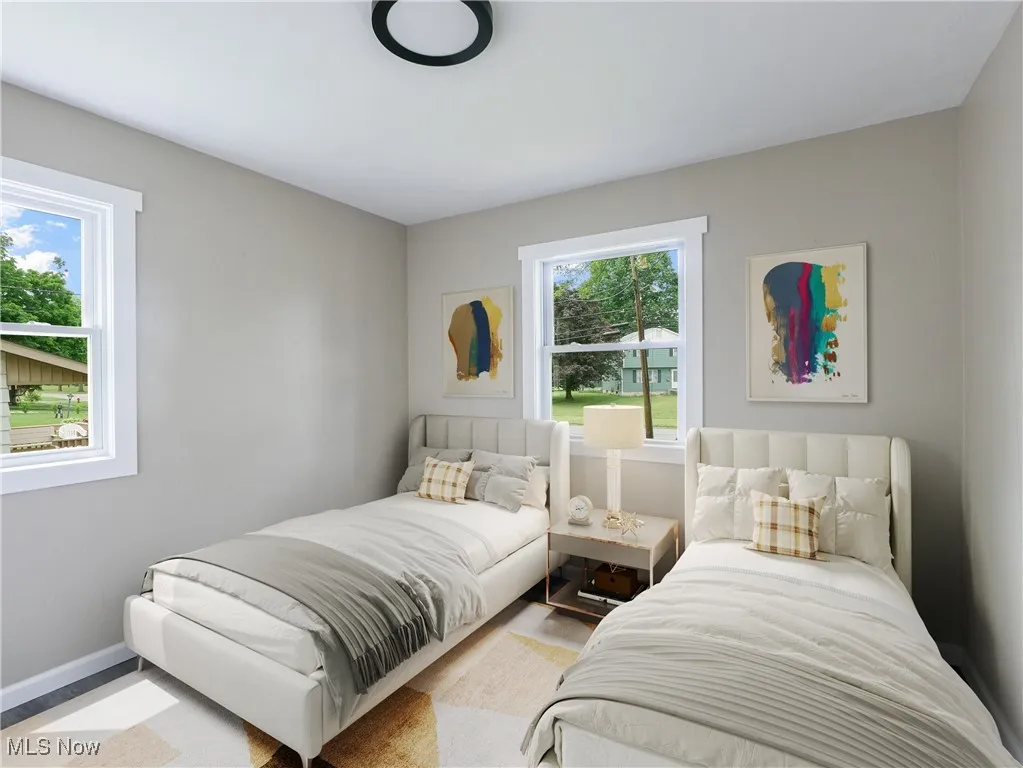 Bedroom featuring baseboards