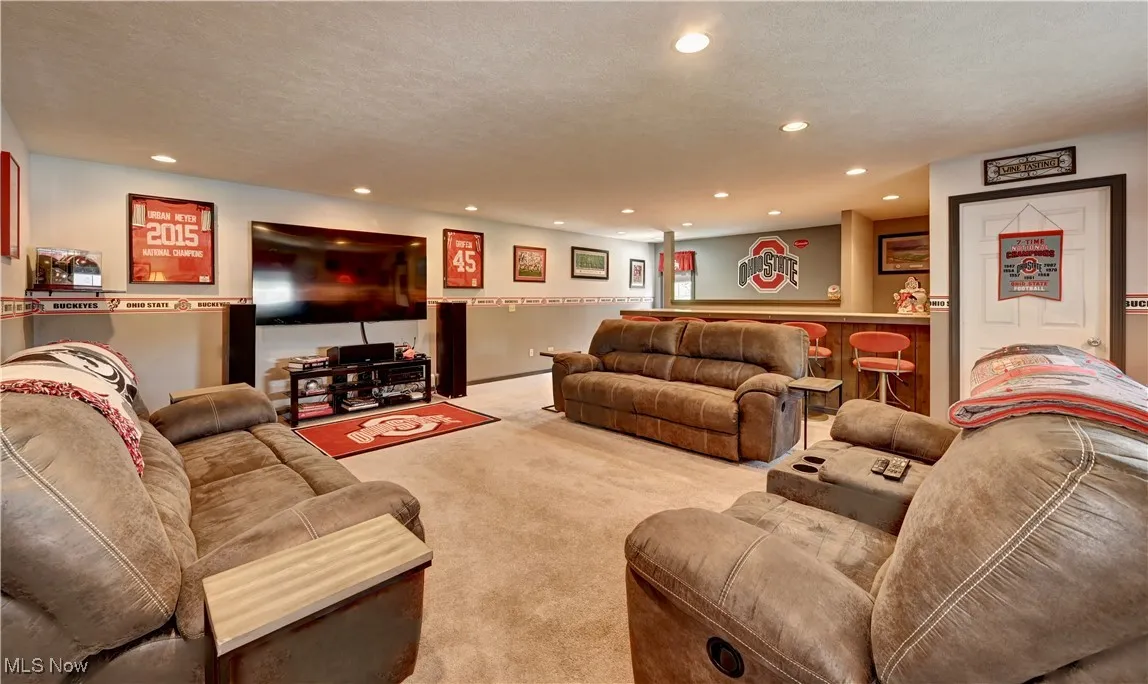 Living room featuring carpet floors and recessed lighting