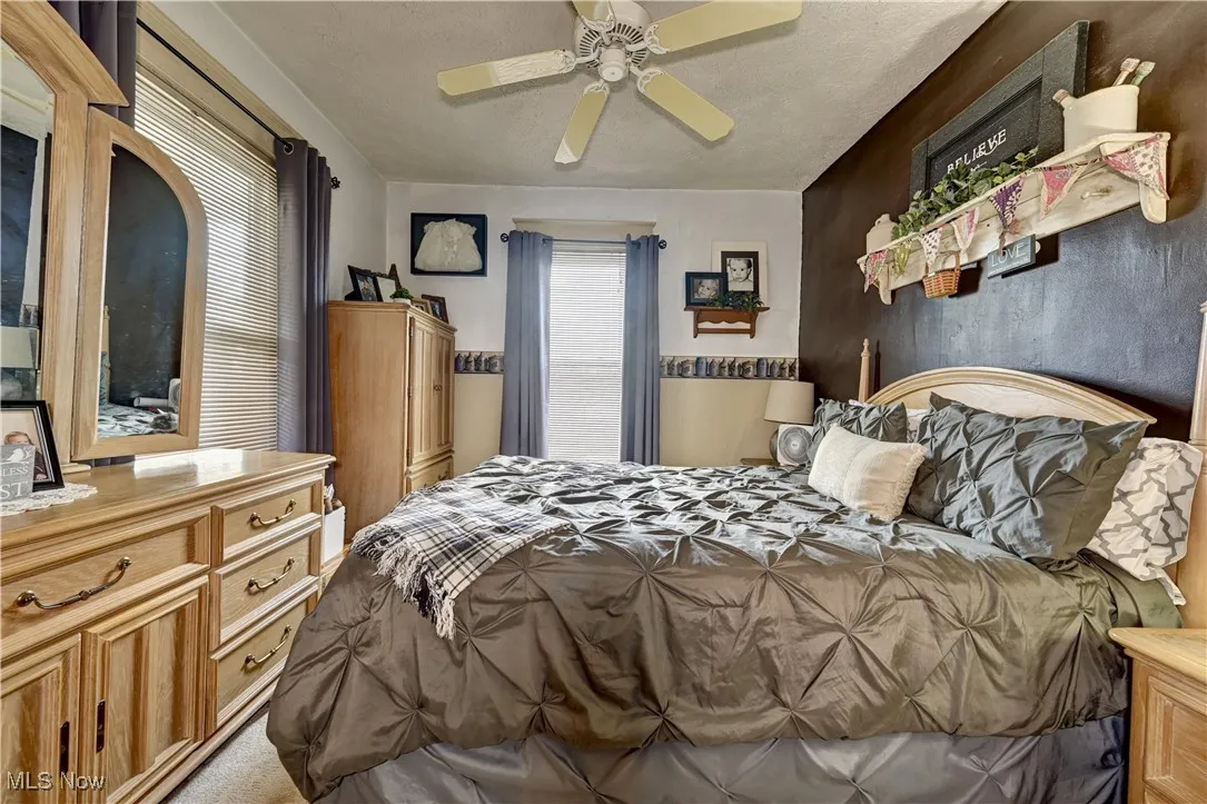 Bedroom with a ceiling fan