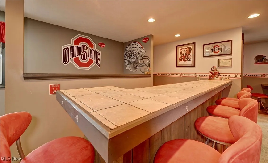 Indoor dry bar with recessed lighting