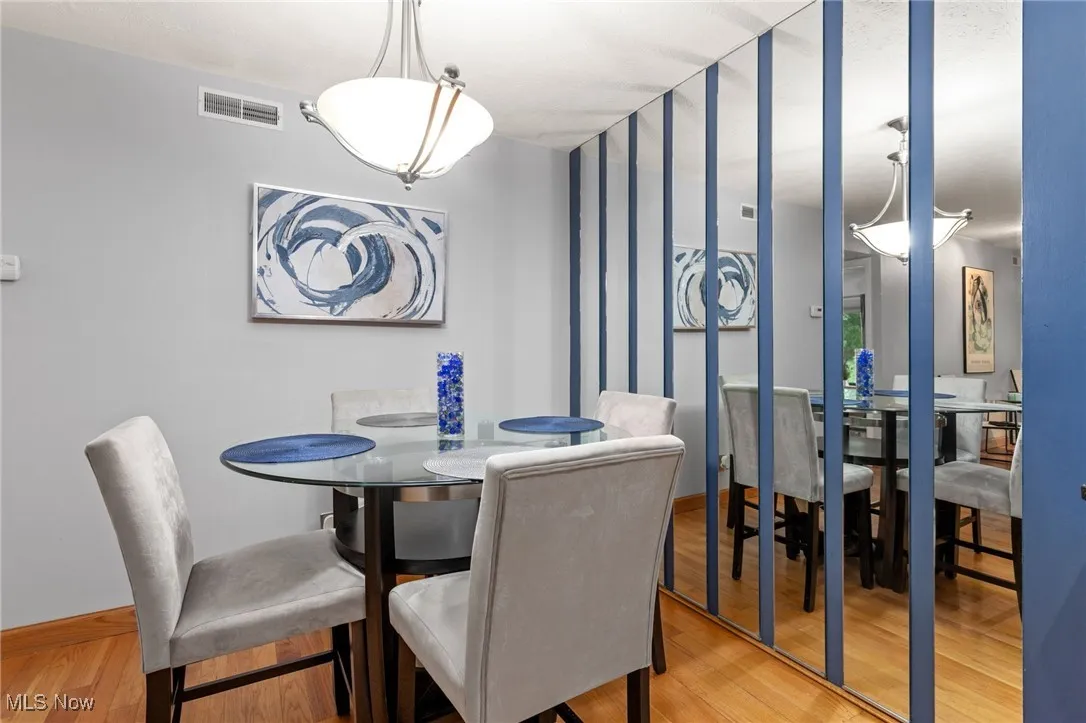 Dining room featuring wood finished floors