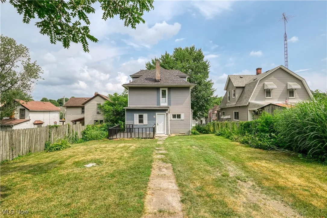 Rear view of house with a residential view