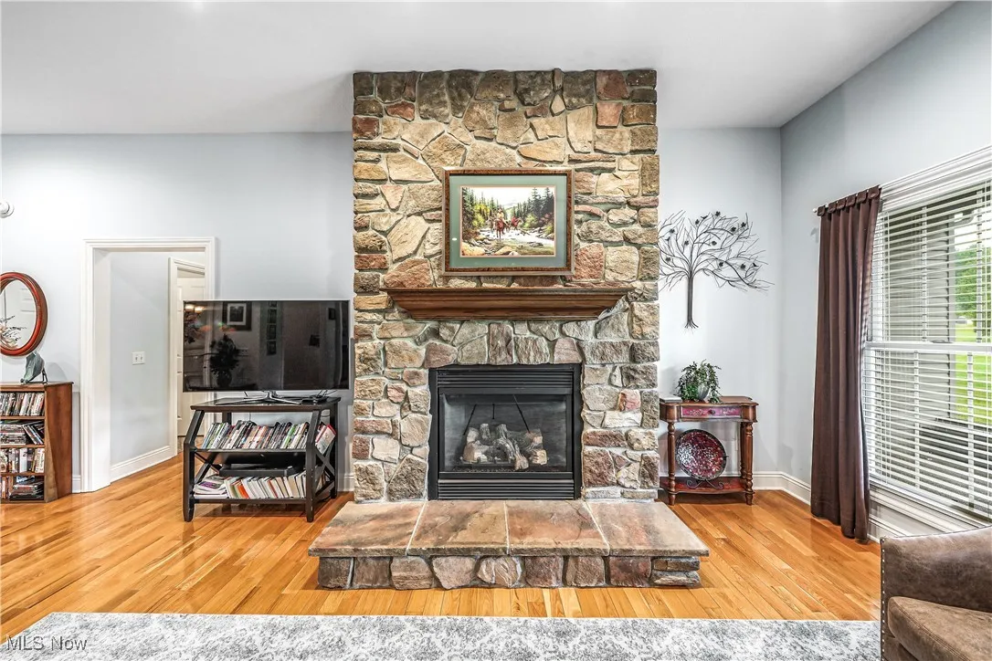 Huge Great Room Boasts Stone Fireplace