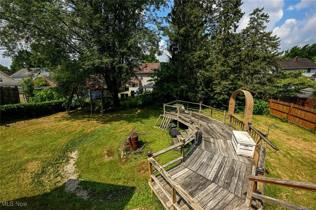 View of yard with a deck