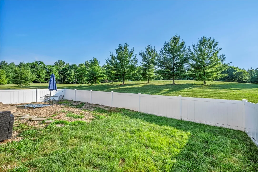 View of yard with view of scattered trees