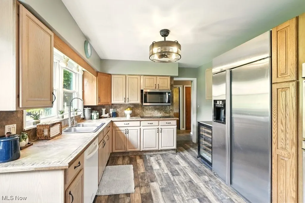 Kitchen with Stainless Steel Appliances and Tile Counter