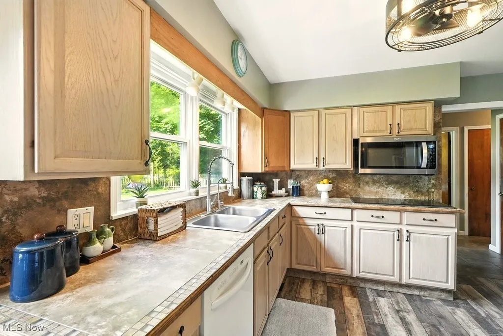Kitchen with Stainless Steel Appliances and Tile Counter