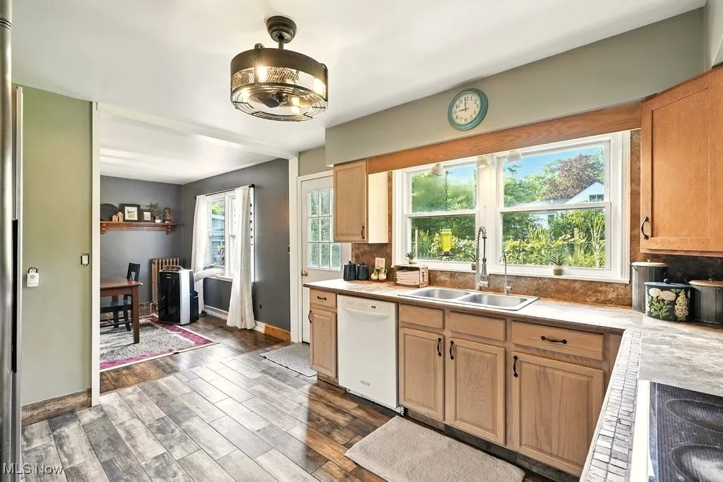 Kitchen with Stainless Steel Appliances and Tile Counter