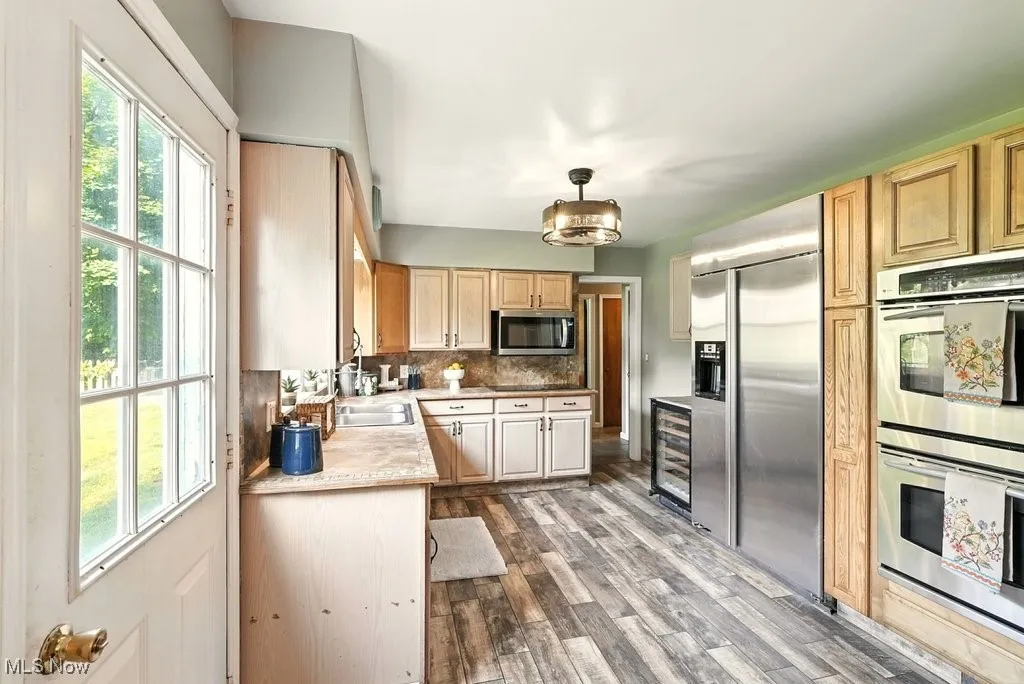Kitchen with Stainless Steel Appliances and Tile Counter