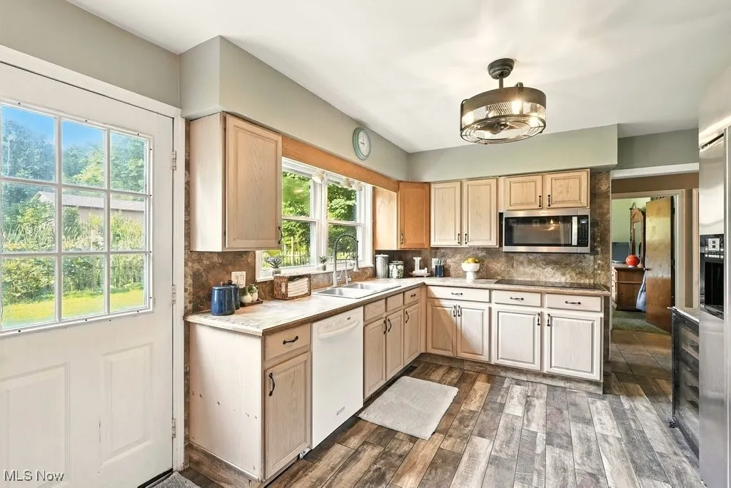 Kitchen with Stainless Steel Appliances and Tile Counter