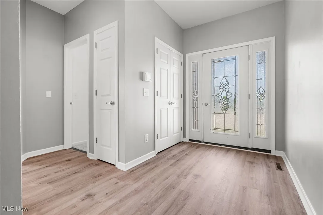 Entryway with light wood-type flooring