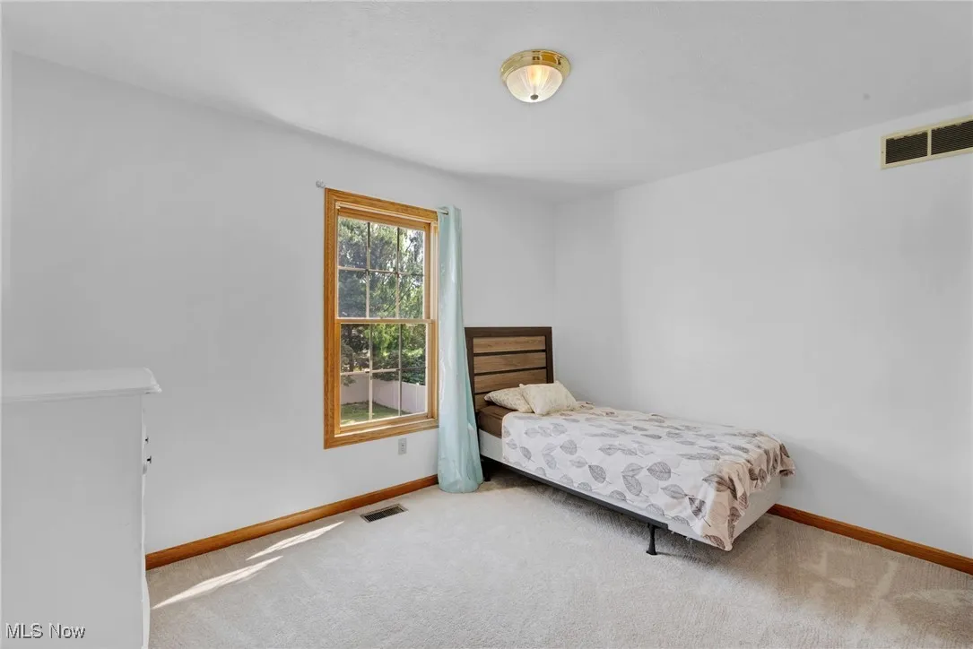 Bedroom featuring carpet flooring