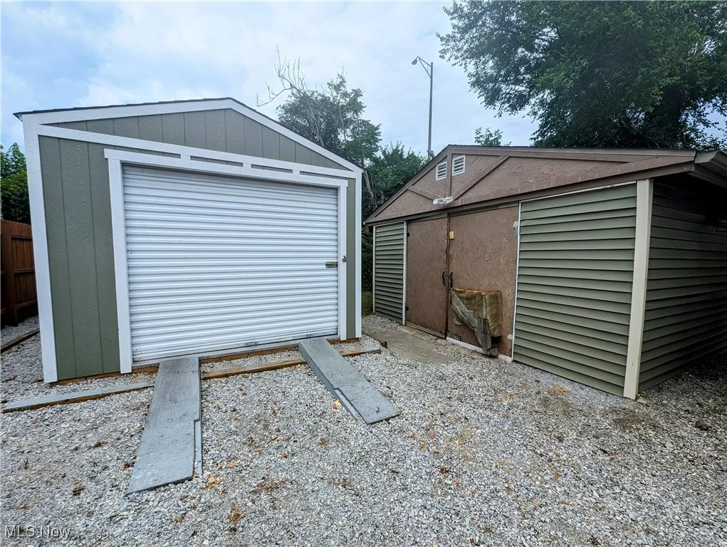 Garage next to outbldg