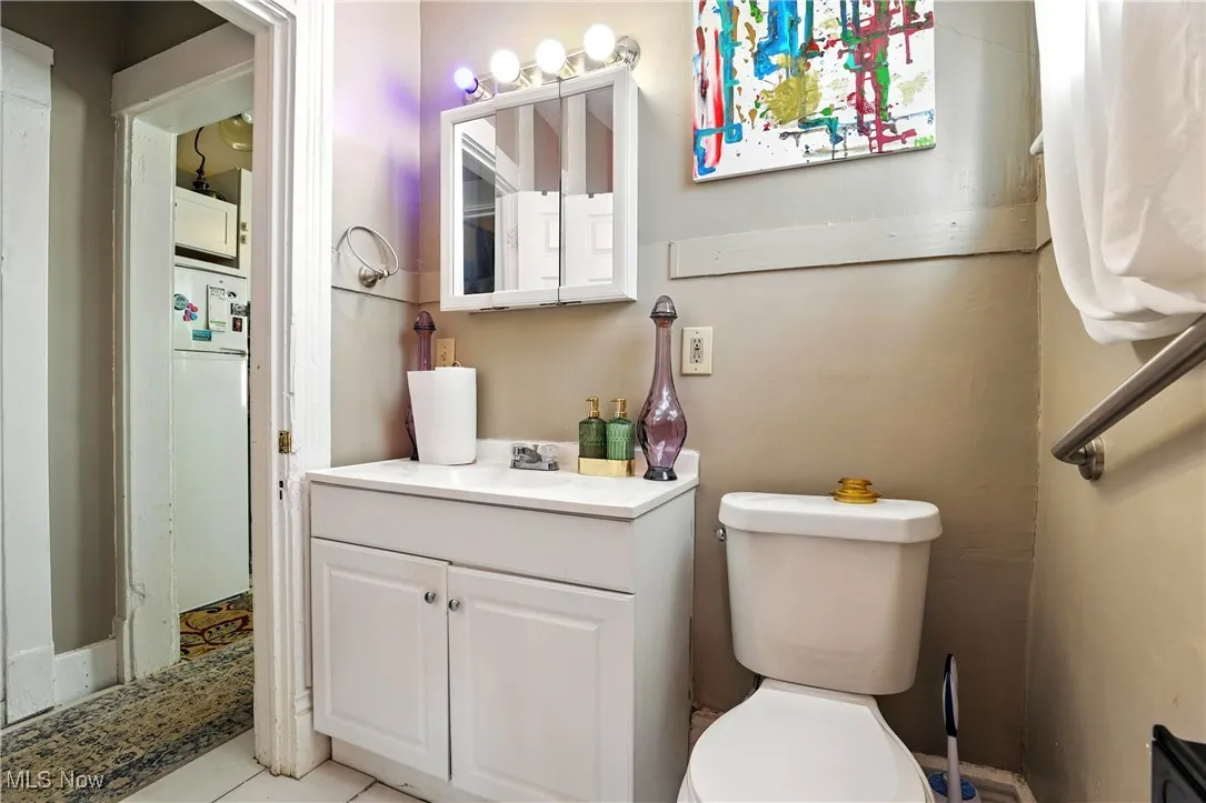 Bathroom with vanity and toilet