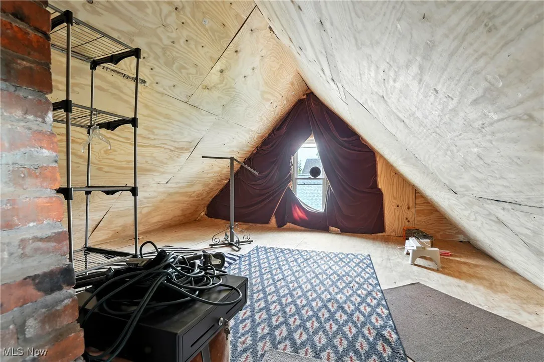 Bonus room featuring vaulted ceiling