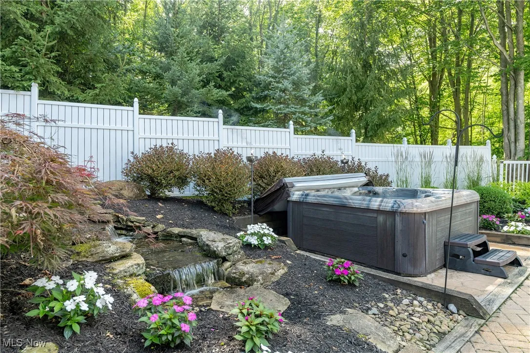 View of waterfall and hot tub