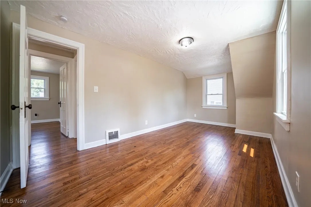 Second floor bedroom, opening to balcony
