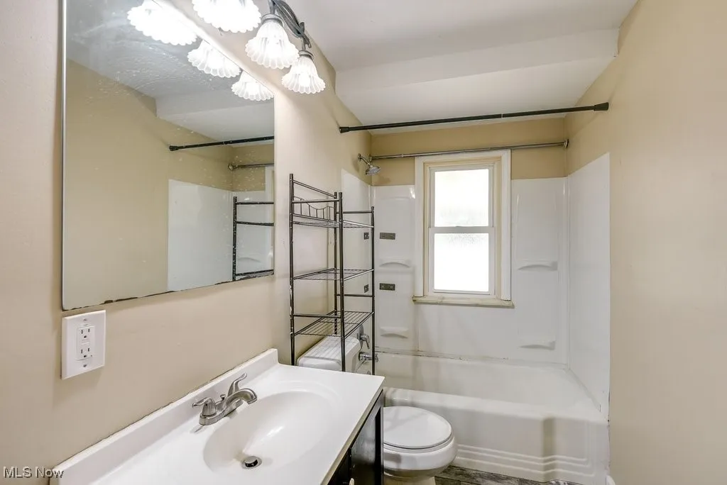 Full bath with tub / shower combination and vanity