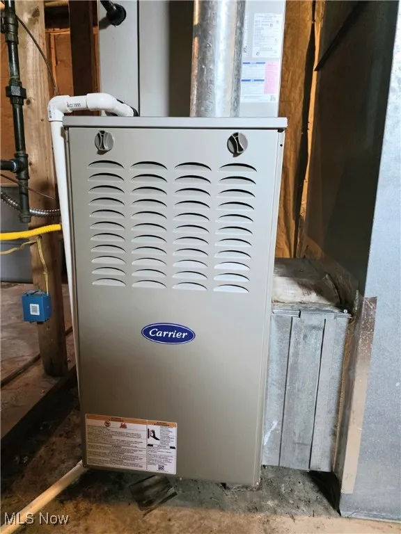 Detailed view of unfinished concrete floors and heating unit