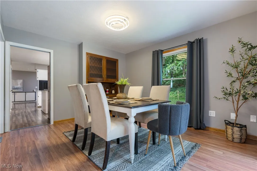 Dining room featuring wood finished floors