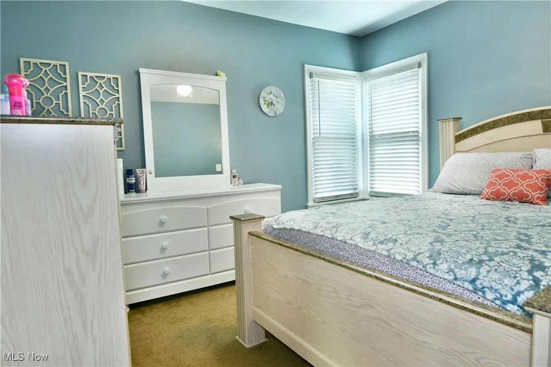 Bedroom featuring carpet flooring