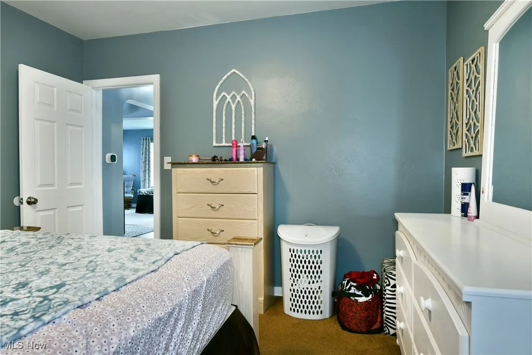 Bedroom with carpet