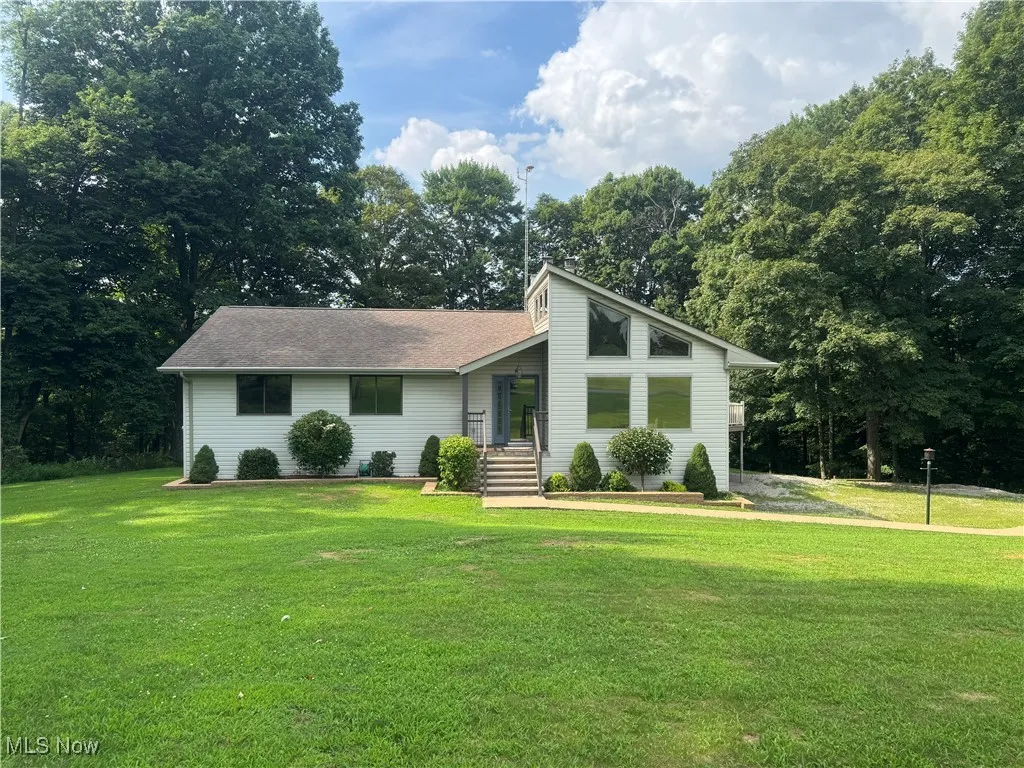 Mid-century home with a front lawn