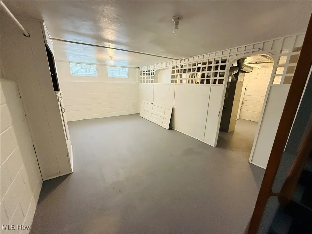 Below grade area with concrete block wall