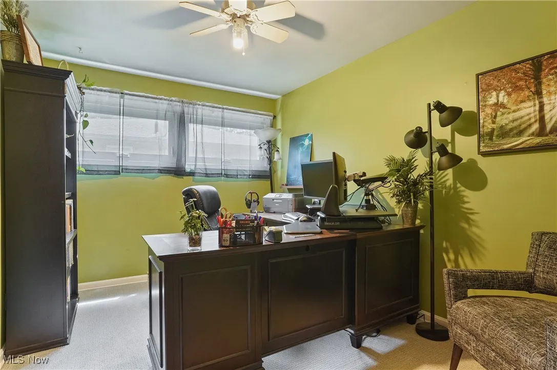 3rd bedroom/Home office with light carpet and a ceiling fan