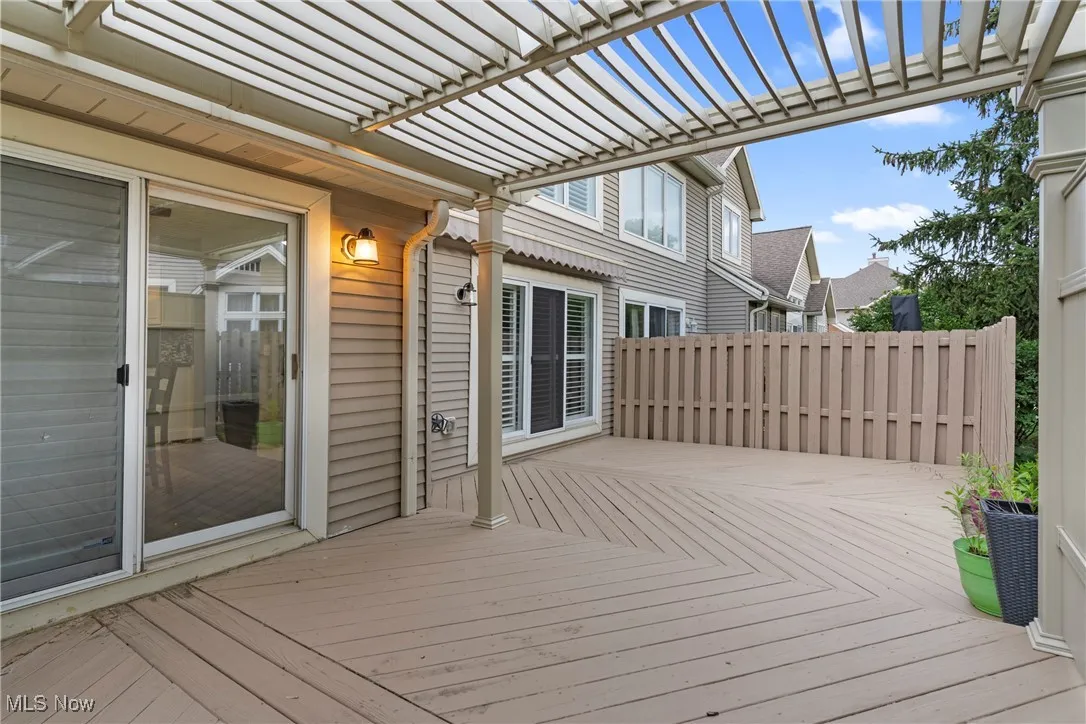 Wooden terrace with a pergola