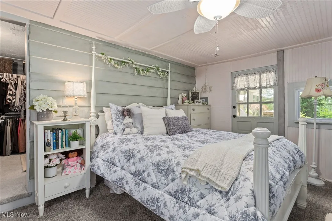 Bedroom with carpet floors and ceiling fan
