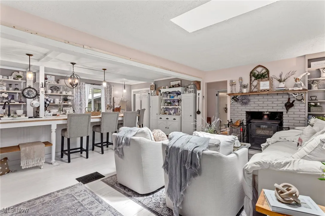 Living area with light wood-style floors