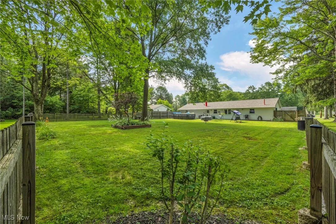 View of fenced backyard