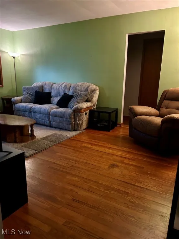 Living room with wood finished floors