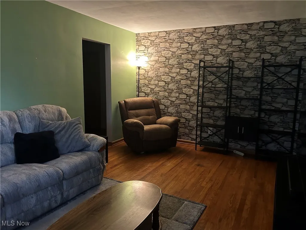 Living area with wood finished floors