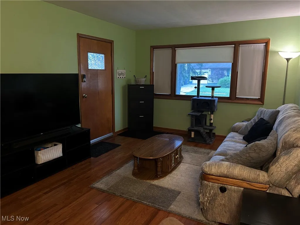 Living area featuring wood finished floors