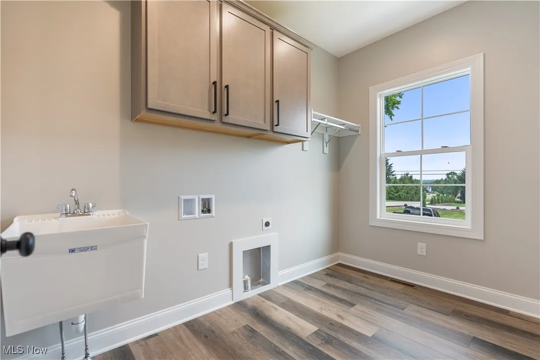 Laundry room with cabinet space