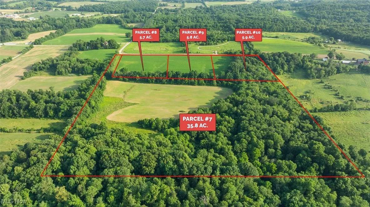 Aerial overview of property's location featuring property parcel outlined and a local golf course