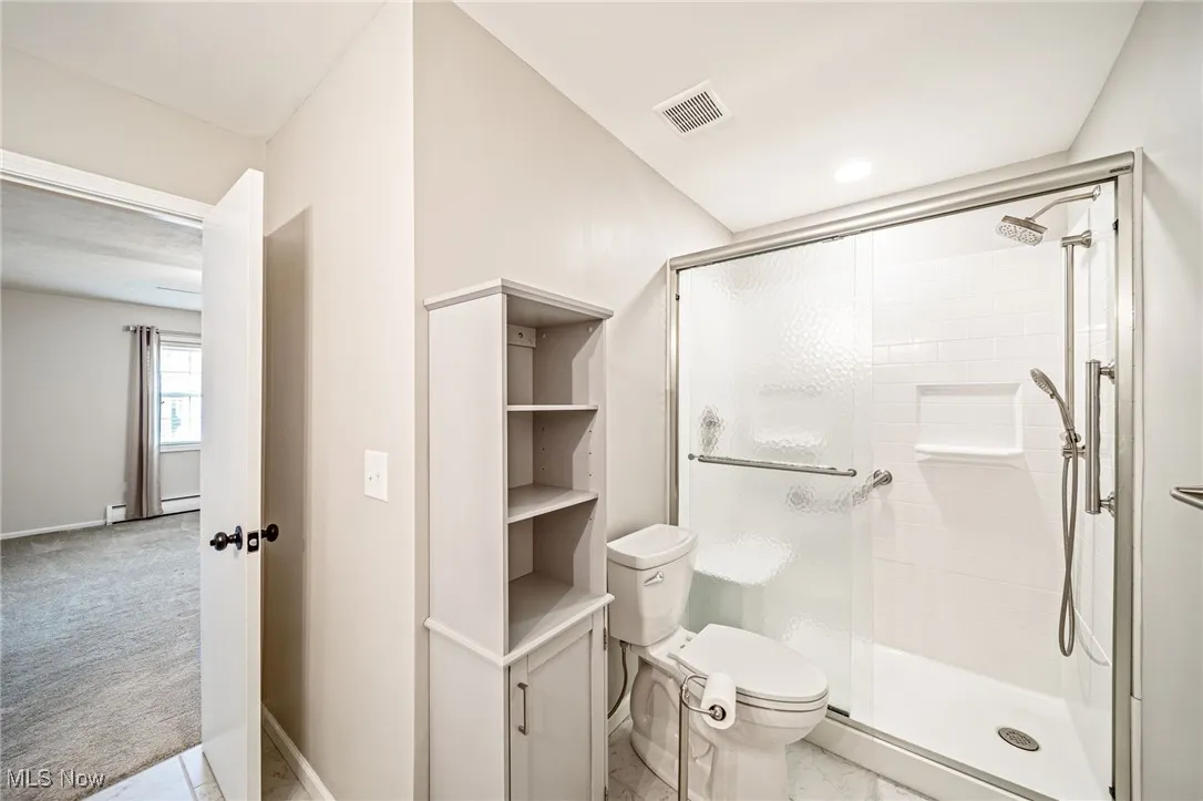 Bathroom with a stall shower