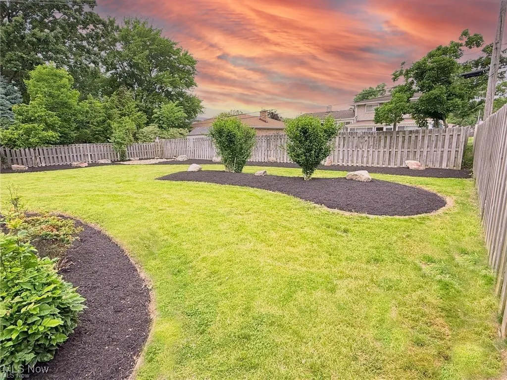 View of fenced backyard