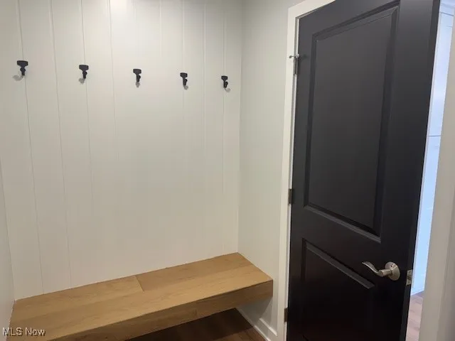 Mudroom with wood finished floors