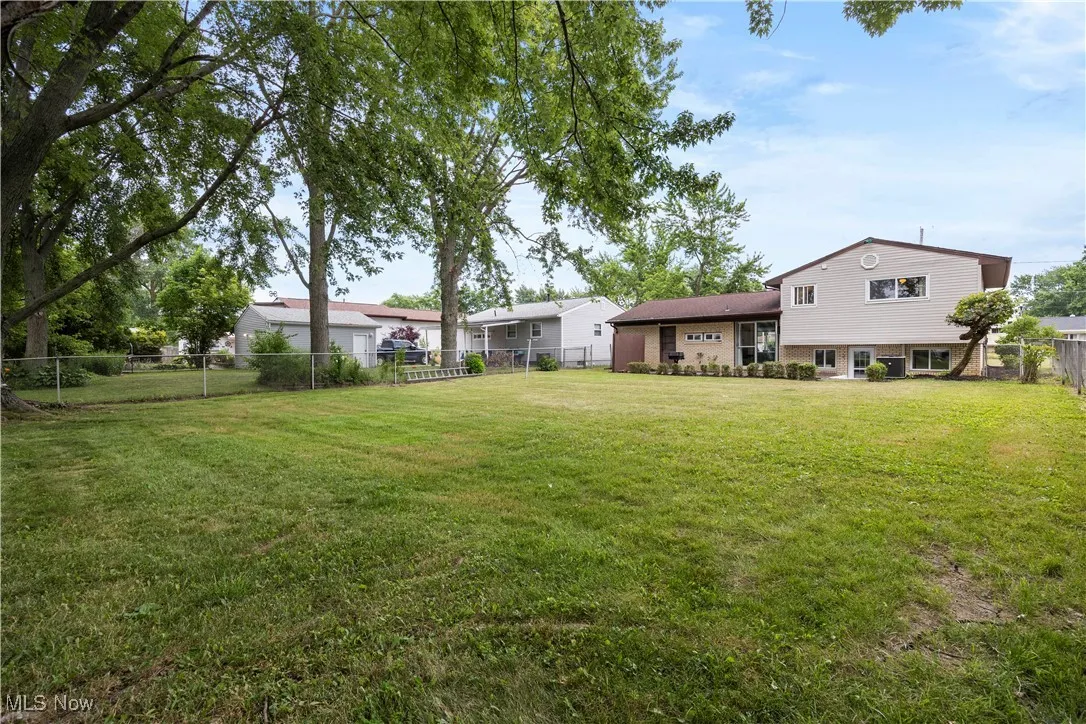 View of fenced backyard