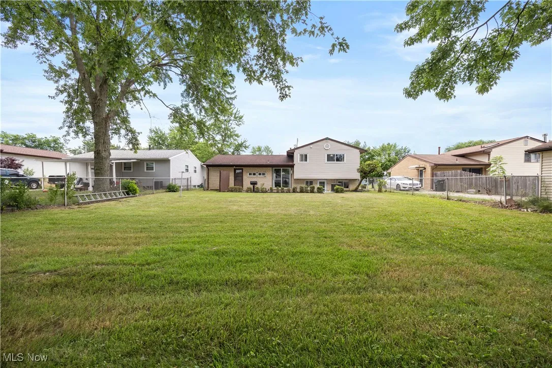 View of fenced backyard