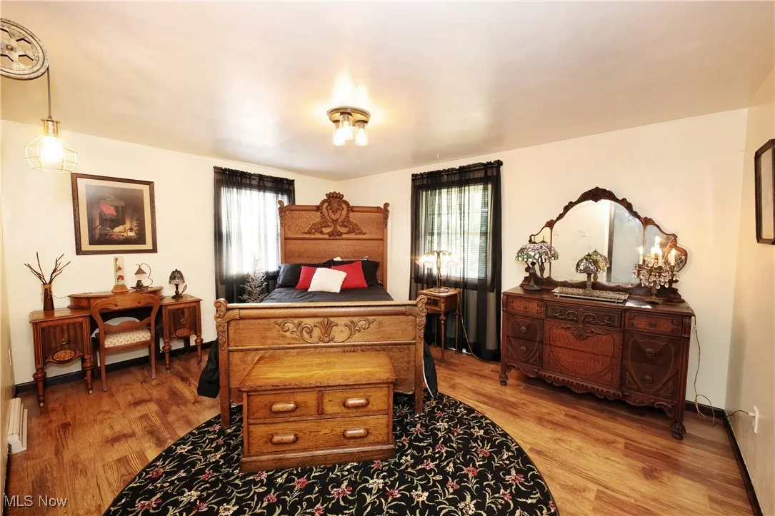 Bedroom featuring wood finished floors