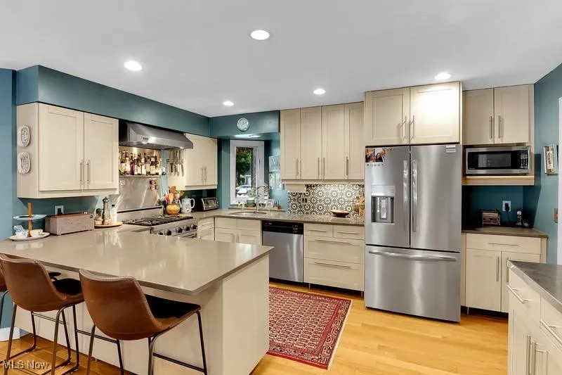 View of kitchen. Window over sink overlooks the front walk.