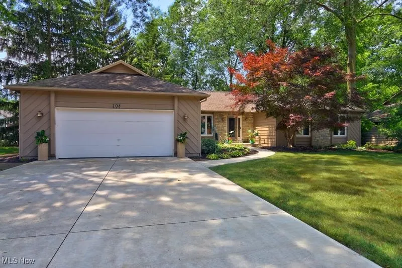 208 Westwind Drive, Avon Lake OH 44011. Stone & cedar executive ranch.